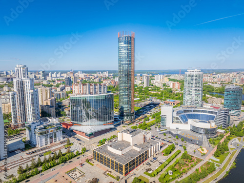 Yekaterinburg city with Buildings of Regional Government and Parliament, Dramatic Theatre, Iset Tower, Yeltsin Center, panoramic view at summer sunset.