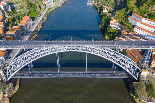 Bridge Luis I above Douro River with train metro in Porto city on Portugal. Aerial view