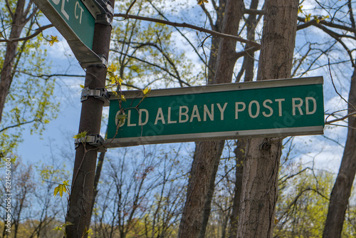 old albany post road street sign in putnam county new york state (national  register of historic places) gravel unpaved street near peekskill photo