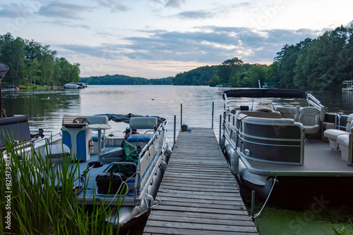 Foto Looking out onto a Wisconsin northwoods lake as the last rays of sunlight begin to fade