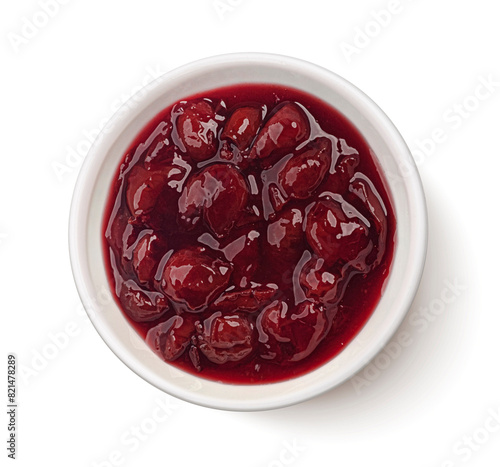 Cherry jam isolated on white background, top view