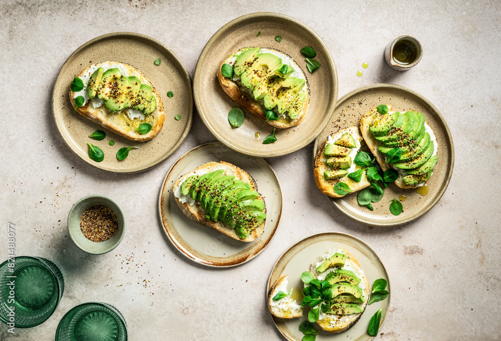 Avocado toast breakfast scene on light background Avocado toast breakfast scene on light background