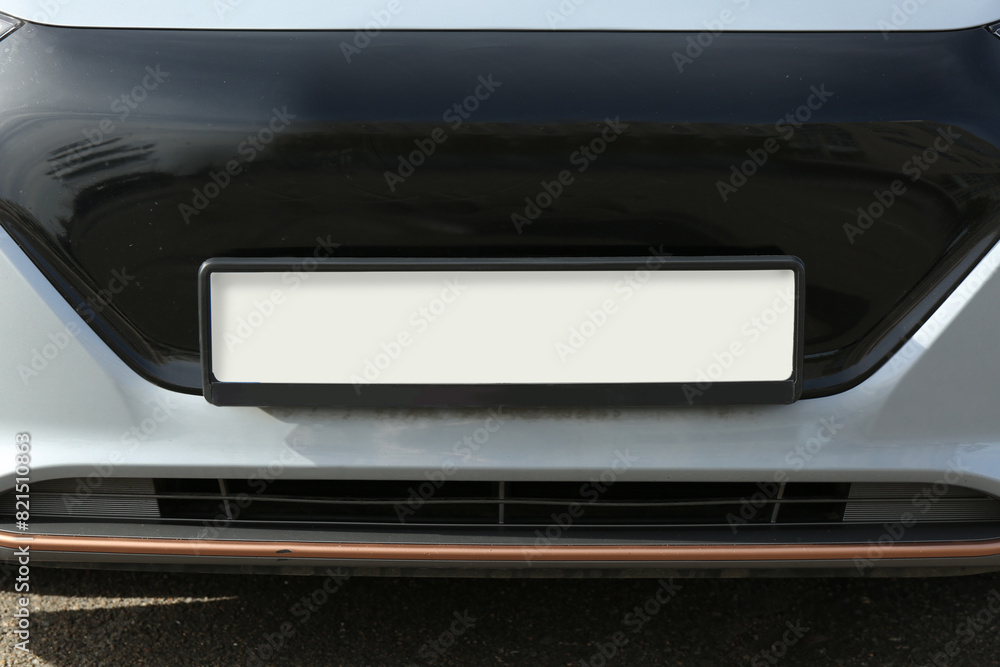 Car with vehicle registration plate, closeup view Car with vehicle registration plate, closeup view