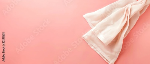 Wallpaper Mural Elegant silk fabric on a coral pink background, offering a soft and luxurious texture for fashion and design concepts. Torontodigital.ca