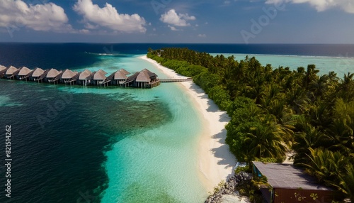 Amazing drone view of the beach and water with beautiful colors. luxury tropical resort or hotel with water villas and beautiful beach scenery. maldives, summer vacation, resort maldivian houses. photo