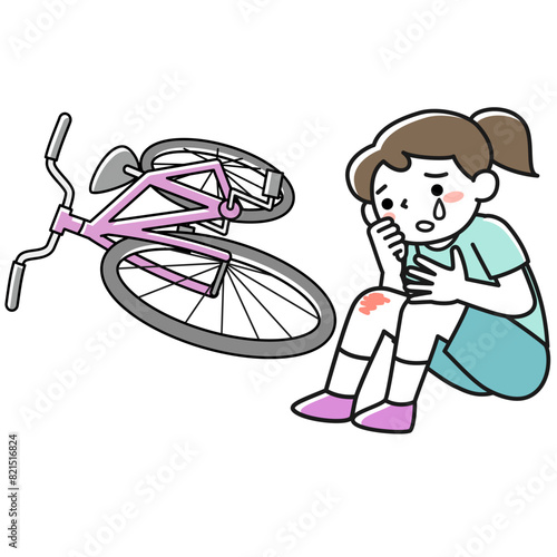 自転車で転んで泣いている女の子