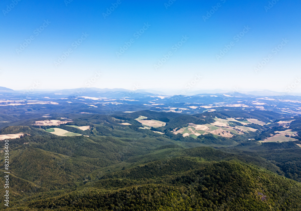 Overhead, the valleys stretch wide and far. Overhead, the valleys stretch wide and far.