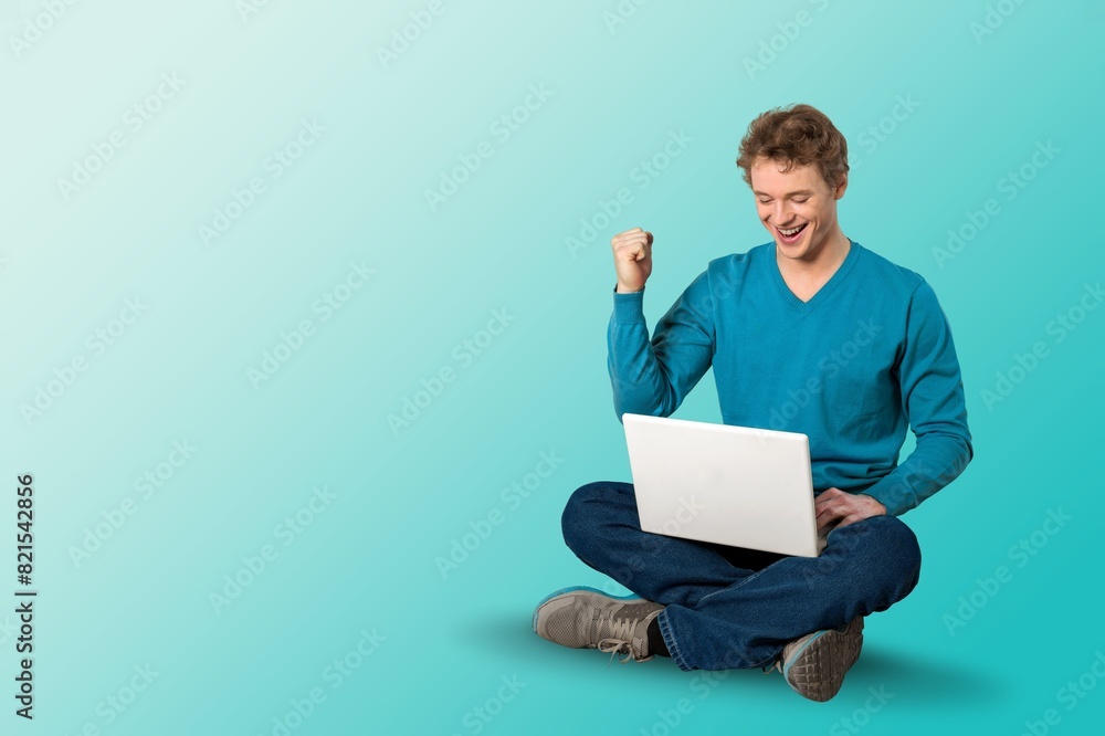 young happy IT man hold laptop pc young happy IT man hold laptop pc