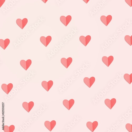 Pink hearts on pastel colored background