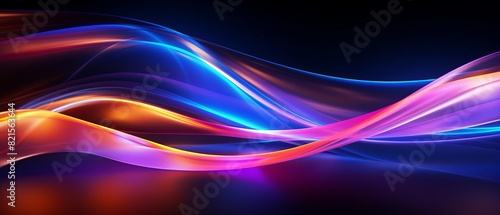 Vibrant colorful light trails on a dark background, creating an abstract and fluid motion effect for creative designs and digital artwork.