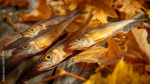 Fresh golden smoked smelt on a beautiful autumn background, detailed close-up emphasizing the rich hues and textures for culinary advertising photo