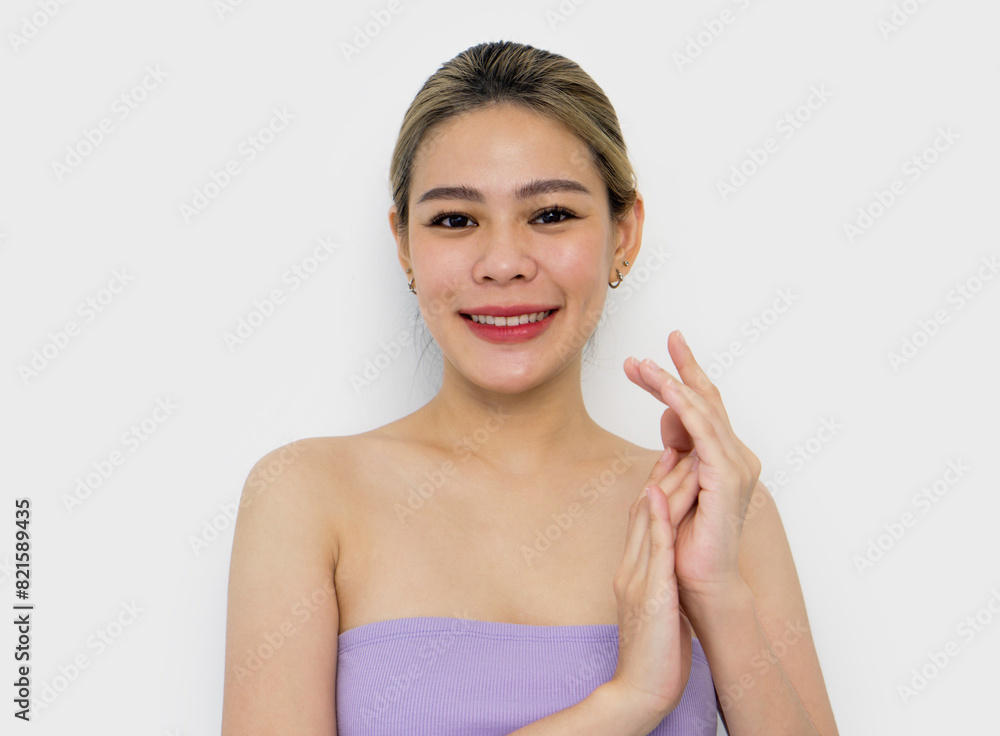 Expressive Emotions: A woman, dressed in a vibrant purple top, strikes a captivating pose. With her hands gracefully framing, she exudes a mix of surprise, awe, and joy. Expressive Emotions: A woman, dressed in a vibrant purple top, strikes a captivating pose. With her hands gracefully framing, she exudes a mix of surprise, awe, and joy.