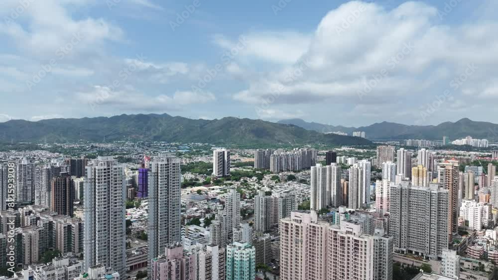Aerial view of YOHO Hub, a massive integrated development featuring residential towers, rail station, and shopping complex in Hong Kong Yuen Long Northern Metropolis Aerial view of YOHO Hub, a massive integrated development featuring residential towers, rail station, and shopping complex in Hong Kong Yuen Long Northern Metropolis