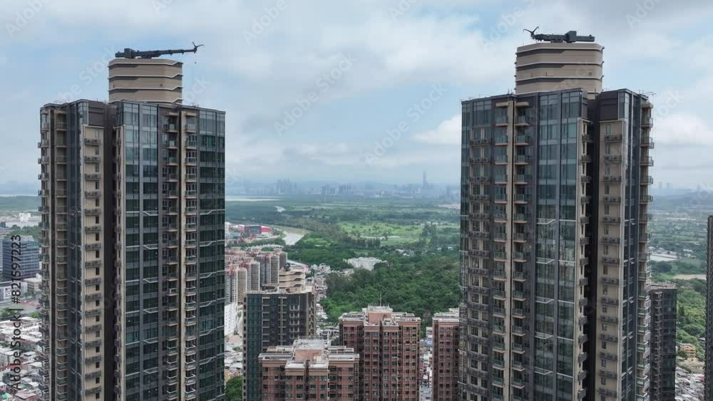 Aerial view of YOHO Hub, a massive integrated development featuring residential towers, rail station, and shopping complex in Hong Kong Yuen Long Northern Metropolis Aerial view of YOHO Hub, a massive integrated development featuring residential towers, rail station, and shopping complex in Hong Kong Yuen Long Northern Metropolis