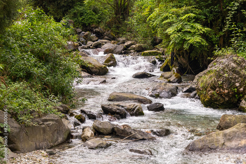 Mountain river nearby Yawu Lake under the Wawu Mountain, in Meishan City of southwest China’s Sichuan Province photo