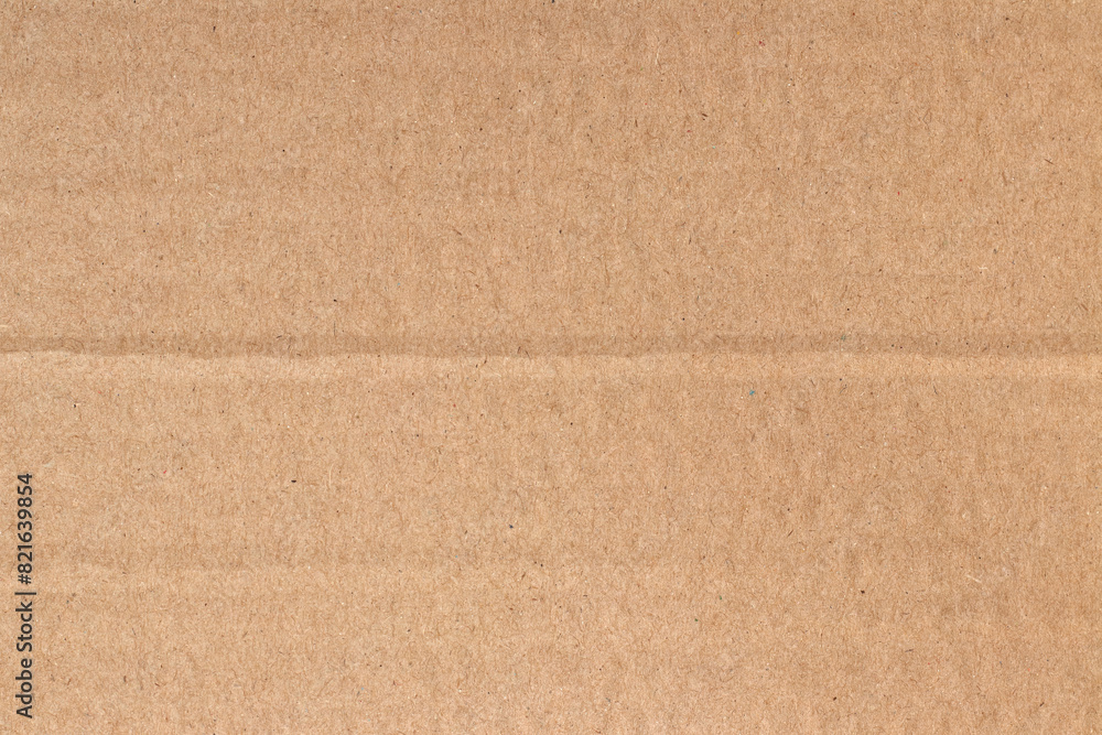 Fototapeta premium Brown cardboard sheet abstract background, texture of recycle paper box in old vintage pattern for design art work.