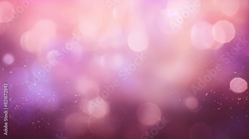 Abstract pink and purple bokeh background with soft glow and sparkle.