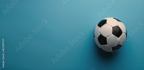 Black and White Soccer Ball on Blue Background