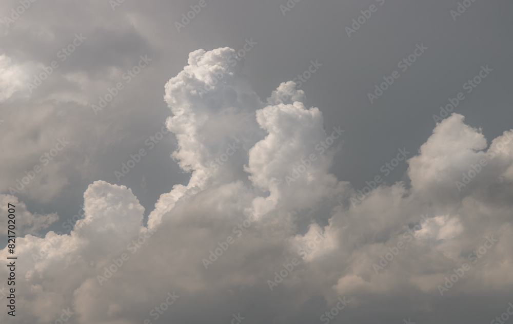 The sky is being covered with fluffy white clouds. Concept idea of Imaginative clouds nature, Amazing sky like a heaven for background wallpaper and texture, Space for text, Selective Focus. The sky is being covered with fluffy white clouds. Concept idea of Imaginative clouds nature, Amazing sky like a heaven for background wallpaper and texture, Space for text, Selective Focus.