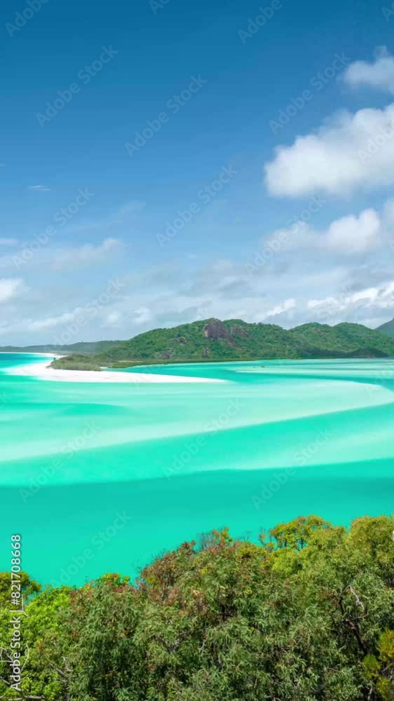 Vertical 4k Timelapse, Light Clouds Above Whitehaven Beach, Whitsunday Island, Australia. White Silica Sand and Turquoise Ocean Water Vertical 4k Timelapse, Light Clouds Above Whitehaven Beach, Whitsunday Island, Australia. White Silica Sand and Turquoise Ocean Water