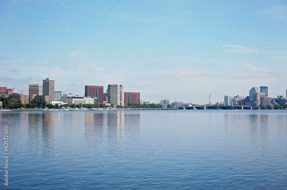Serene Boston skyline and river on a clear sunny day Serene Boston skyline and river on a clear sunny day