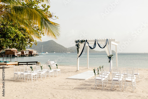 St Lucia beach wedding setup with ocean and palms photo