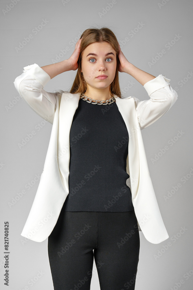 Excited Young Woman in Stylish Outfit Surprised Expression Excited Young Woman in Stylish Outfit Surprised Expression