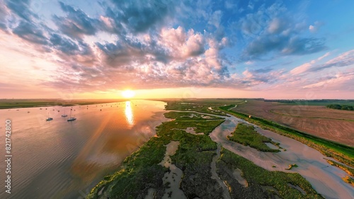An aerial view of a spectacular sunset over the River Deben at Bawdsey Beach in Suffolk, UK
