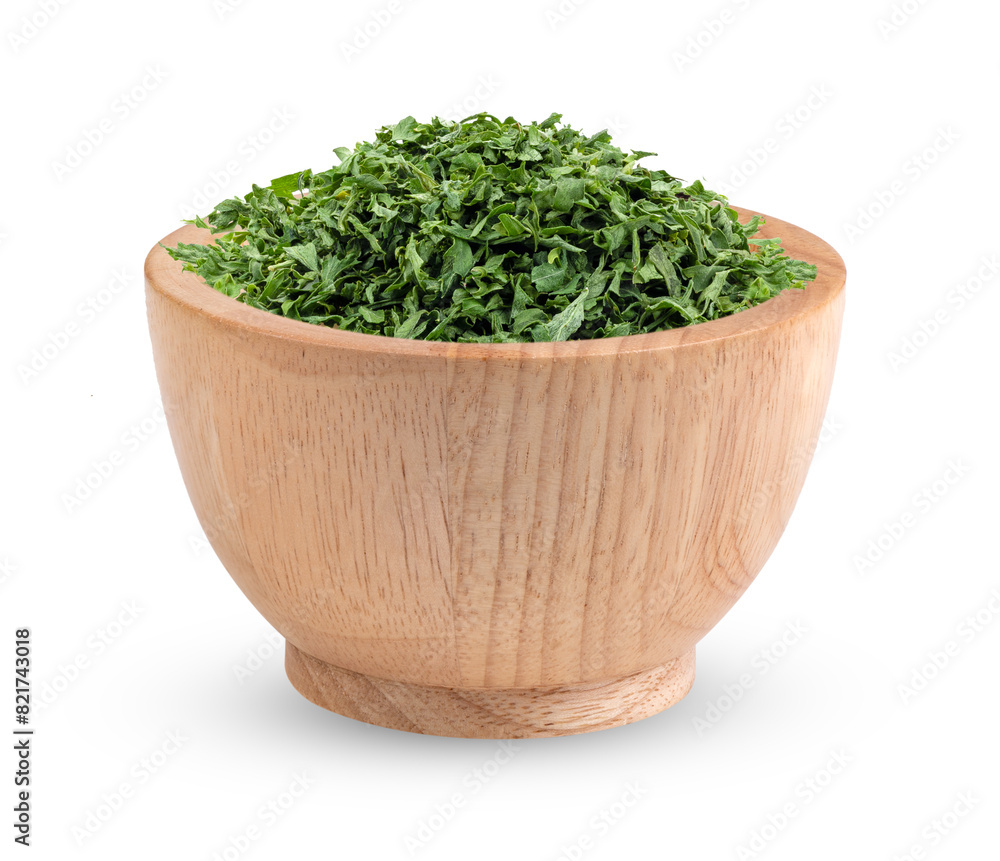 Dried parsley in wood spoon isolated on transparent png Dried parsley in wood spoon isolated on transparent png
