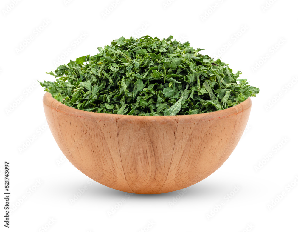 Dried parsley in wood spoon isolated on transparent png Dried parsley in wood spoon isolated on transparent png