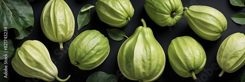 chayote fruits and leaves on plain black background from Generative AI