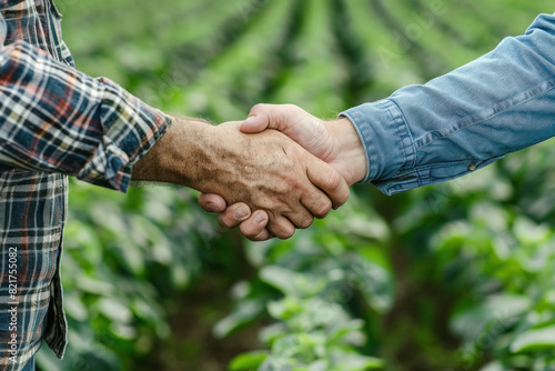 Close view of farmer and officer shake hand