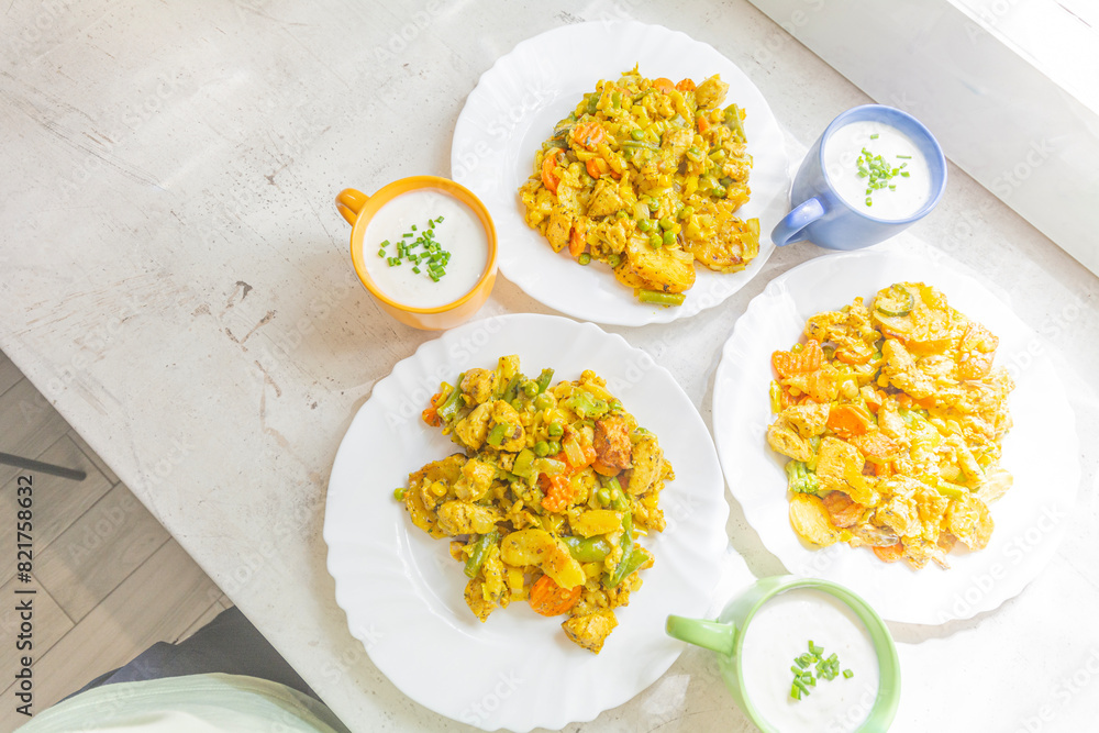 Chicken stewed with vegetables and kefir with chives. Chicken stewed with vegetables and kefir with chives.