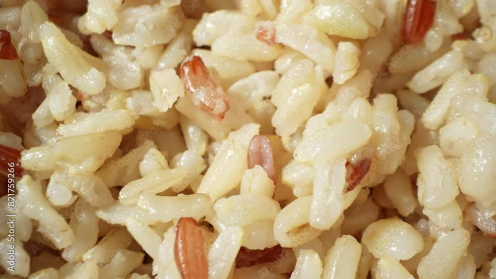 Fluffy and inviting, this close-up of cooked Jasmine brown rice reveals its tender texture and subtle grain variations. Ready to serve, it promises a wholesome and satisfying meal.
Fluffy and inviting, this close-up of cooked Jasmine brown rice reveals its tender texture and subtle grain variations. Ready to serve, it promises a wholesome and satisfying meal.