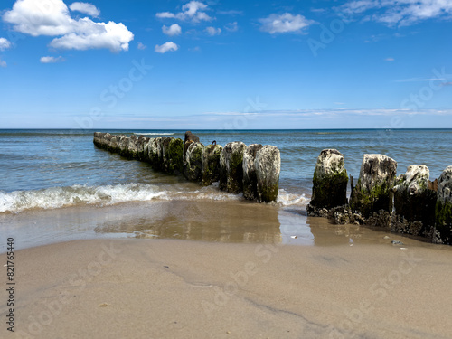 Fototapeta Naklejka Na Ścianę i Meble -  Groyne on the beach on the Polish Baltic Sea coast