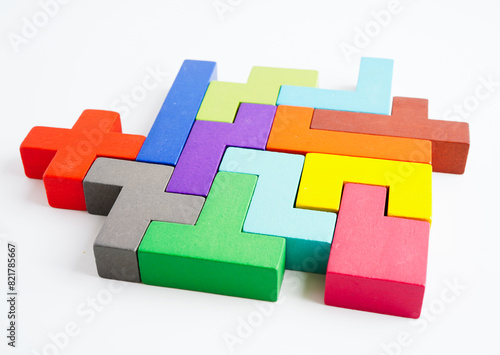 Logical thinking and problem solving problem solution creative business concept, wooden puzzle geometric block shape.