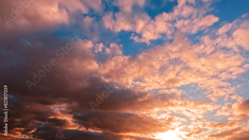 pretty sundown gold clouds on the sky background - photo of nature