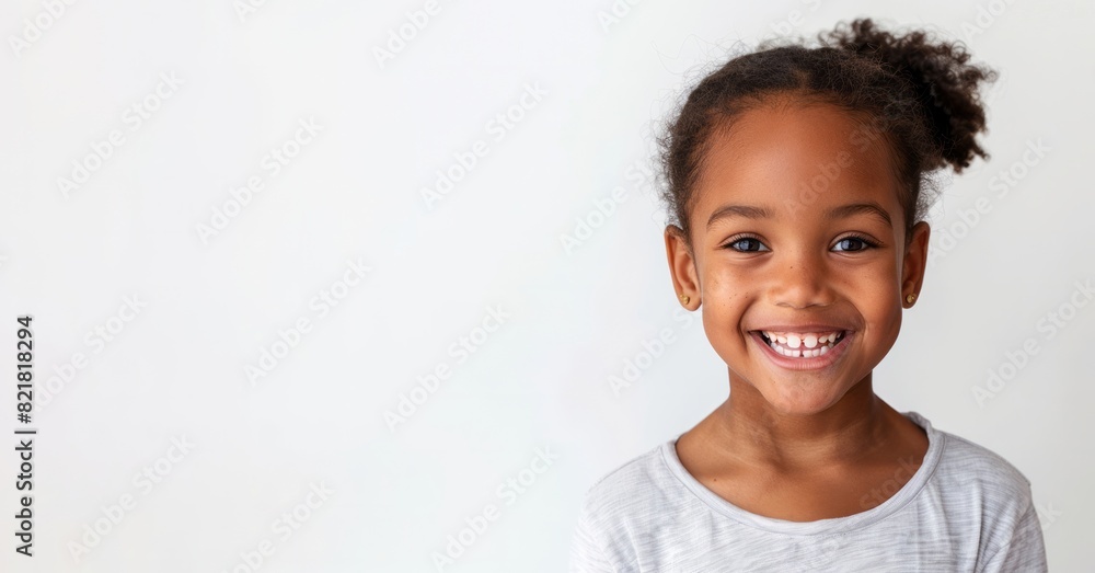 Cute little girl portrait on studio background, smiling child in white background. Cute little girl portrait on studio background, smiling child in white background.