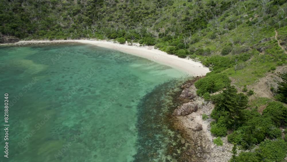 Aerial view of Blue Pearl Bay with lush greenery and turquoise clear water, Whitsundays, Australia. Aerial view of Blue Pearl Bay with lush greenery and turquoise clear water, Whitsundays, Australia.