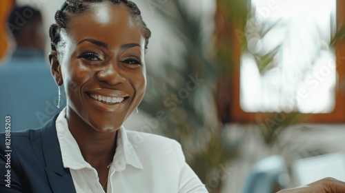 Fototapeta Naklejka Na Ścianę i Meble -  Happy african business woman handshaking at office meeting. Smiling female hr hiring recruit at job interview, bank or insurance agent, lawyer making deal with client at work