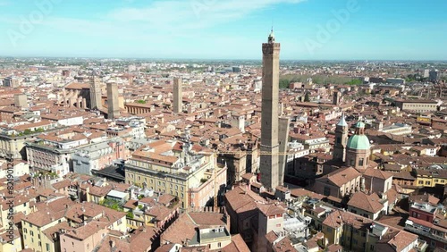 Smooth flight near two towers Bologna Italy and its construction photo