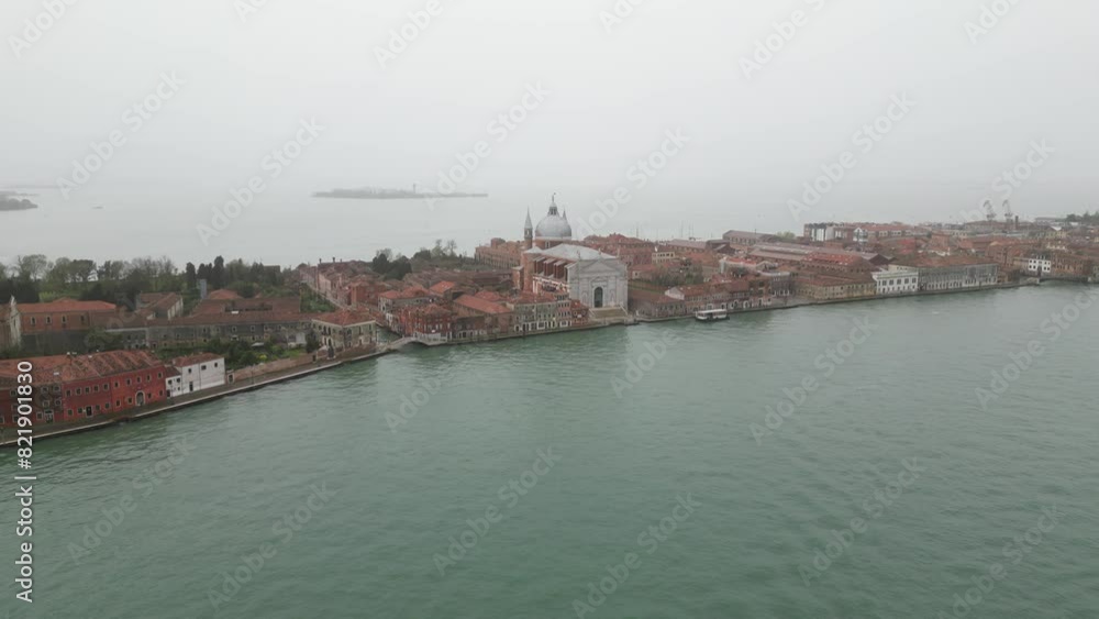 Venice Italy cinematic view along the water on foggy day Venice Italy cinematic view along the water on foggy day