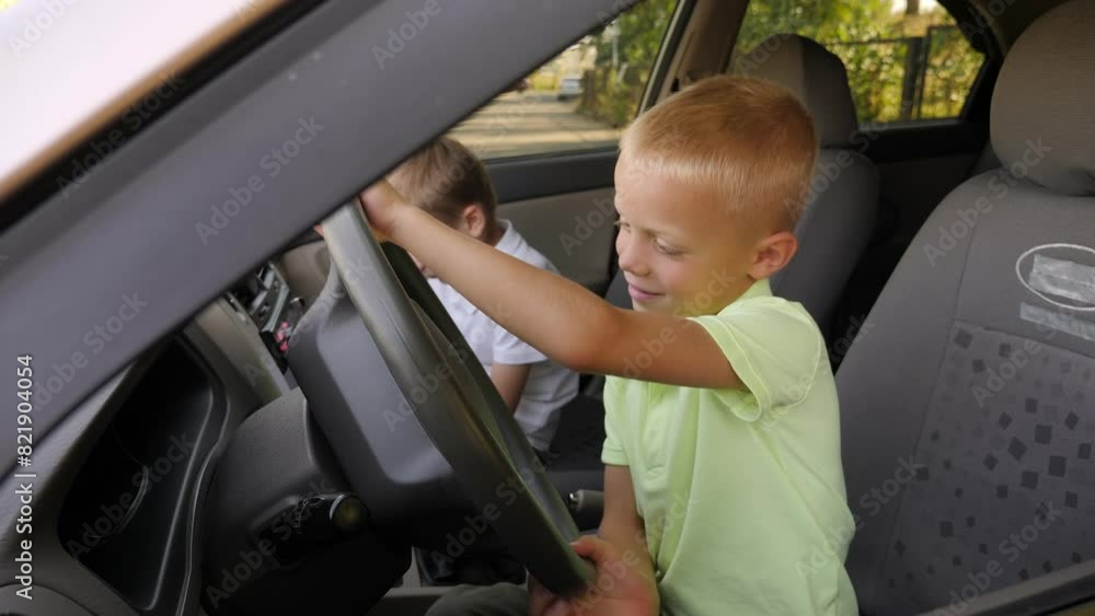 Two boys are playing in the car while driving, they imagine themselves as adult drivers. Two boys are playing in the car while driving, they imagine themselves as adult drivers.