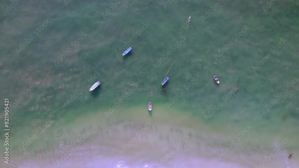 Aerial view of serene Indian Ocean with boats, Diani, Kwale, Kenya. Aerial view of serene Indian Ocean with boats, Diani, Kwale, Kenya.