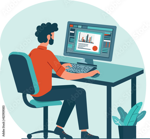 A man working with graphs at the desk