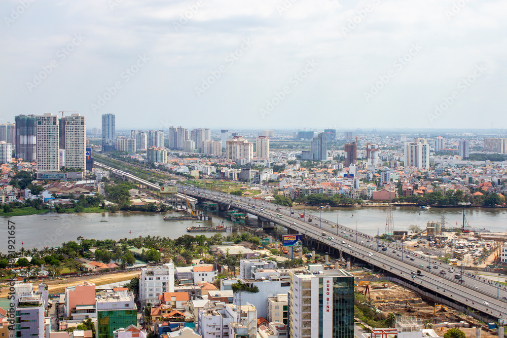 Obraz premium Aerial View Of Saigon Bridge Across Saigon River In Ho Chi Minh City, Vietnam.