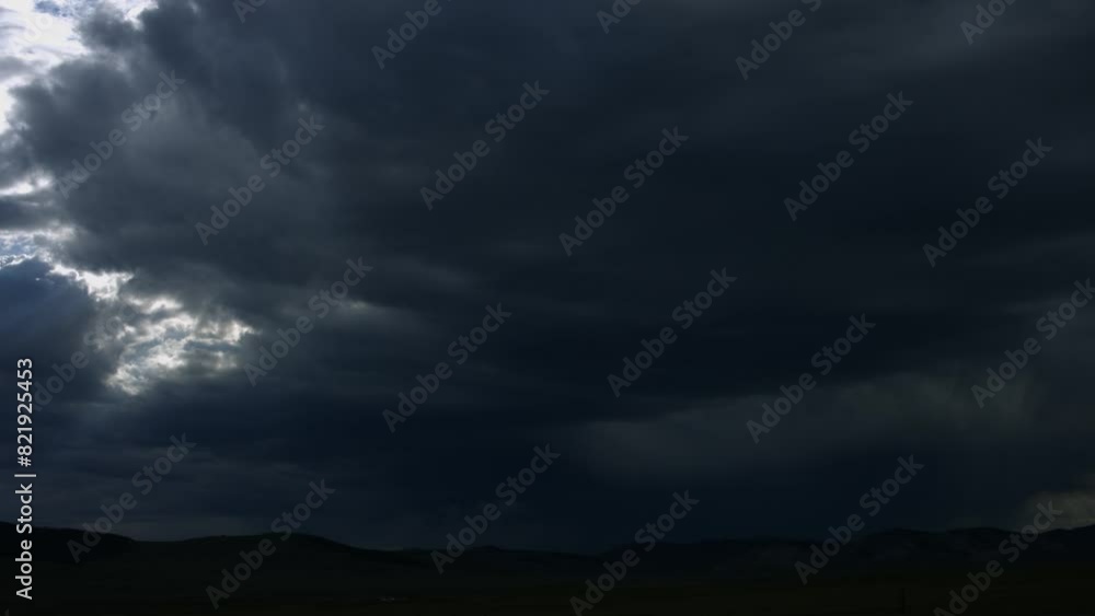 Landscape scene of range hills under dark cloudy sky, for wallpaper Landscape scene of range hills under dark cloudy sky, for wallpaper