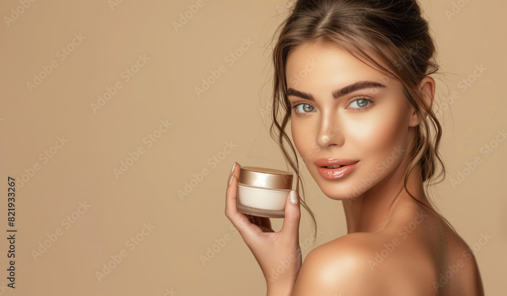 A beautiful woman with natural makeup and glossy lips holds a skincare cream jar, looking confidently at the camera against a beige background A beautiful woman with natural makeup and glossy lips holds a skincare cream jar, looking confidently at the camera against a beige background