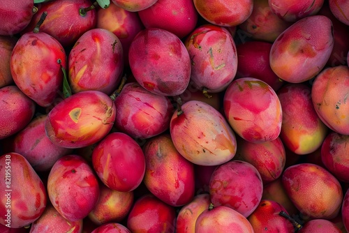 lot of red fresh mango fruits -- photo