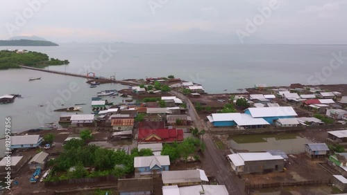 Aerial view of fishing village at sunrise on Bungin Island, Sumbawa, Indonesia. photo